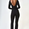 Helene Modal Ruched Plunge Flared Jumpsuit in Black Helene Modal Ruched Plunge Flared Jumpsuit in Black