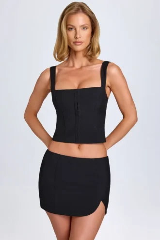 Issa Curved Low-Rise Mini Skirt in Black Issa Curved Low-Rise Mini Skirt in Black