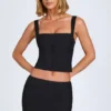 Issa Curved Low-Rise Mini Skirt in Black Issa Curved Low-Rise Mini Skirt in Black