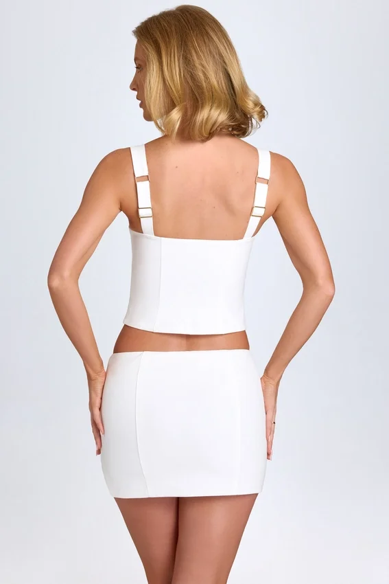 Issa Curved Low-Rise Mini Skirt in White Issa Curved Low-Rise Mini Skirt in White