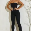 Jamila Strapless Flared Hem Jumpsuit in Black Jamila Strapless Flared Hem Jumpsuit in Black