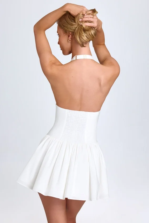 Jessalie Pintucked Halterneck Mini Dress in White Jessalie Pintucked Halterneck Mini Dress in White