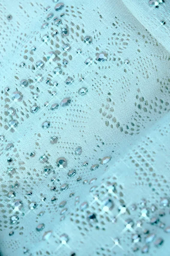 Liberty Embellished Cross-Strap Bikini Top in Ice Blue Liberty Embellished Cross-Strap Bikini Top in Ice Blue