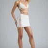 Liberty Embellished Cross-Strap Bikini Top in Ivory Liberty Embellished Cross-Strap Bikini Top in Ivory