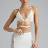 Joni Embellished Mid-Rise Mini Skirt in Ivory Joni Embellished Mid-Rise Mini Skirt in Ivory