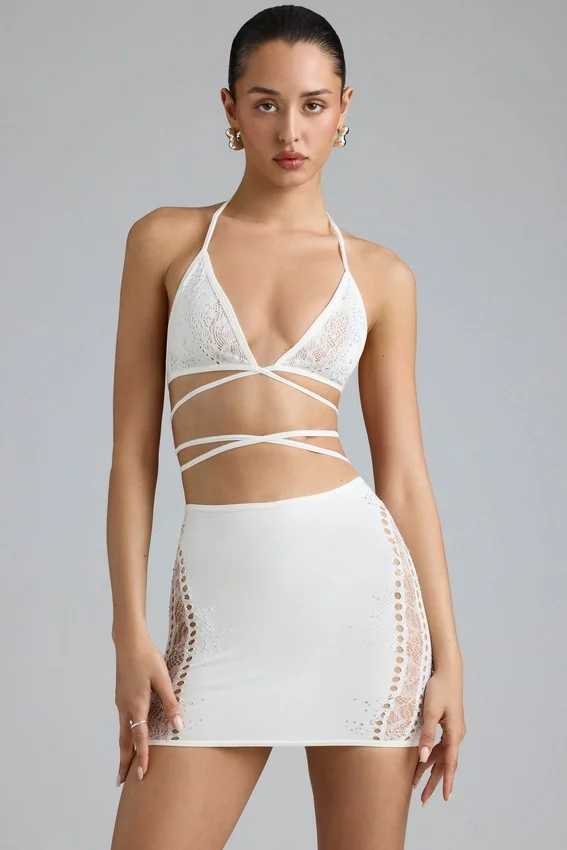 Joni Embellished Mid-Rise Mini Skirt in Ivory Joni Embellished Mid-Rise Mini Skirt in Ivory