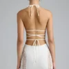 Joni Embellished Mid-Rise Mini Skirt in Ivory Joni Embellished Mid-Rise Mini Skirt in Ivory