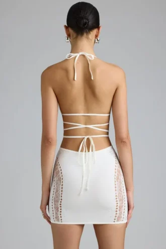 Joni Embellished Mid-Rise Mini Skirt in Ivory Joni Embellished Mid-Rise Mini Skirt in Ivory