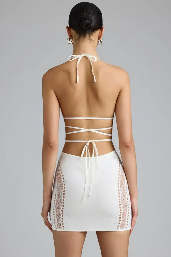 Joni Embellished Mid-Rise Mini Skirt in Ivory Joni Embellished Mid-Rise Mini Skirt in Ivory