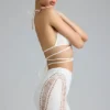 Joni Embellished Mid-Rise Mini Skirt in Ivory Joni Embellished Mid-Rise Mini Skirt in Ivory