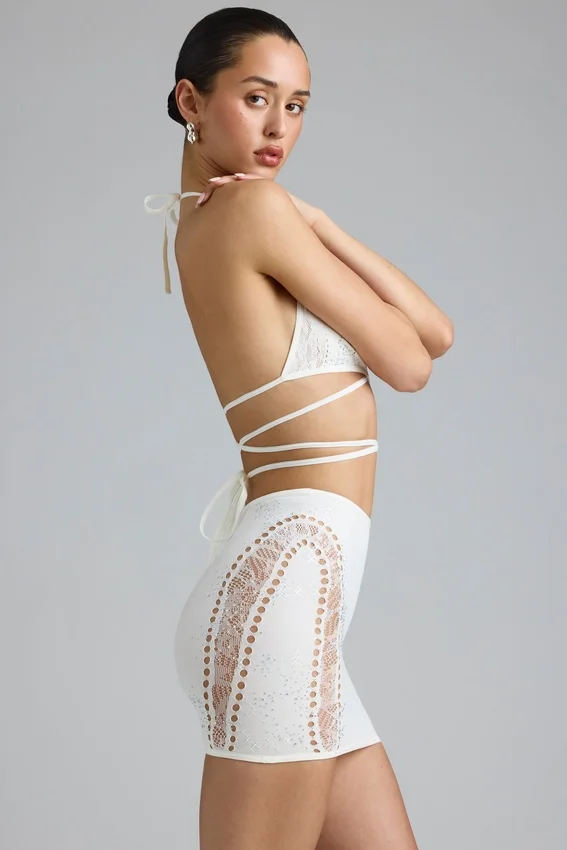 Joni Embellished Mid-Rise Mini Skirt in Ivory Joni Embellished Mid-Rise Mini Skirt in Ivory