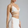 Joni Embellished Mid-Rise Mini Skirt in Ivory Joni Embellished Mid-Rise Mini Skirt in Ivory