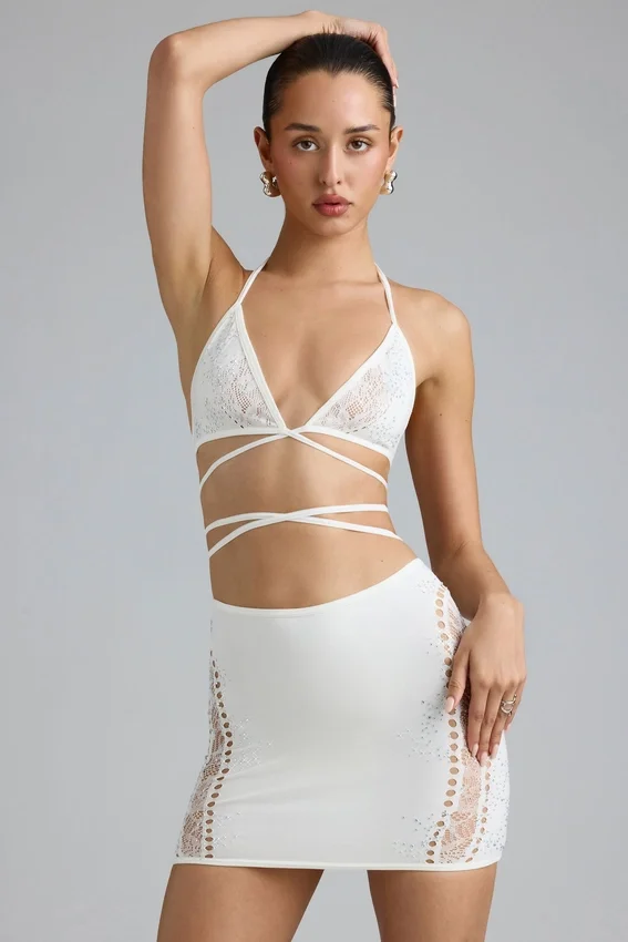 Joni Embellished Mid-Rise Mini Skirt in Ivory Joni Embellished Mid-Rise Mini Skirt in Ivory