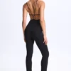 Kiki Modal Plunge Open-Back Flared Jumpsuit in Black Kiki Modal Plunge Open-Back Flared Jumpsuit in Black