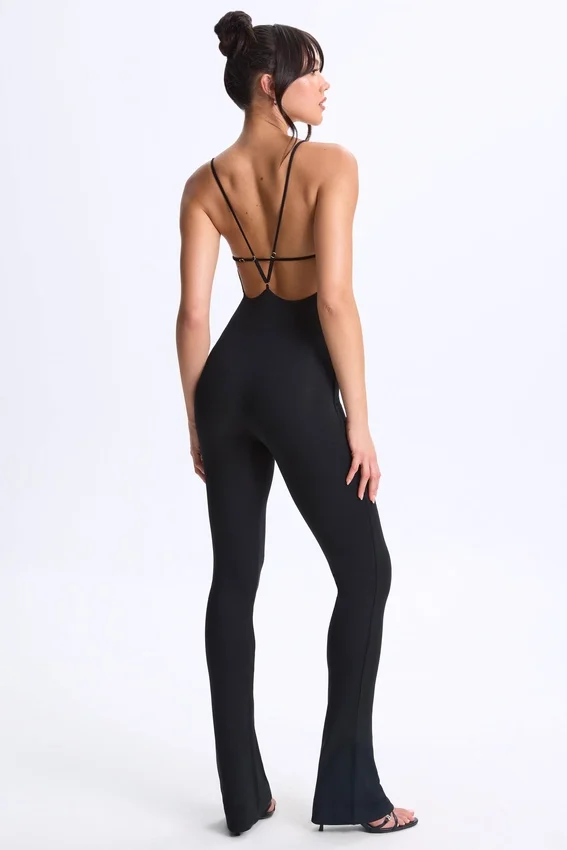 Kiki Modal Plunge Open-Back Flared Jumpsuit in Black Kiki Modal Plunge Open-Back Flared Jumpsuit in Black