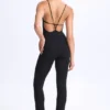 Kiki Modal Plunge Open-Back Flared Jumpsuit in Black Kiki Modal Plunge Open-Back Flared Jumpsuit in Black