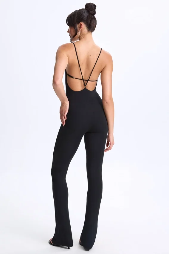 Kiki Modal Plunge Open-Back Flared Jumpsuit in Black Kiki Modal Plunge Open-Back Flared Jumpsuit in Black