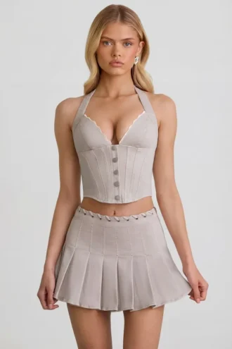 Laika Low-Rise Pleated Mini Skirt in Ecru Laika Low-Rise Pleated Mini Skirt in Ecru