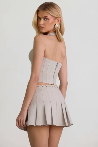 Laika Low-Rise Pleated Mini Skirt in Ecru Laika Low-Rise Pleated Mini Skirt in Ecru