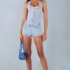 Lalita Button-Down Halterneck Playsuit in Light Denim Lalita Button-Down Halterneck Playsuit in Light Denim