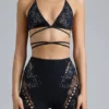 Liberty Embellished Cross-Strap Bikini Top in Black Liberty Embellished Cross-Strap Bikini Top in Black