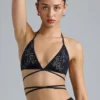Liberty Embellished Cross-Strap Bikini Top in Black Liberty Embellished Cross-Strap Bikini Top in Black