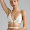 Liberty Embellished Cross-Strap Bikini Top in Ivory Liberty Embellished Cross-Strap Bikini Top in Ivory