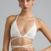 Liberty Embellished Cross-Strap Bikini Top in Ivory Liberty Embellished Cross-Strap Bikini Top in Ivory
