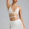 Liberty Embellished Cross-Strap Bikini Top in Ivory Liberty Embellished Cross-Strap Bikini Top in Ivory