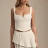 Nada Layered Pleated Low-Rise Mini Skirt in Ivory