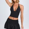 Nellary Ruffled Shirred Low-Rise Micro Mini Skirt in Black