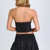 Nellary Ruffled Shirred Low-Rise Micro Mini Skirt in Black