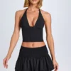 Nellary Ruffled Shirred Low-Rise Micro Mini Skirt in Black