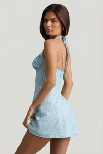 Nerine Halterneck A-Line Mini Dress in Blue Flower Print Nerine Halterneck A-Line Mini Dress in Blue Flower Print