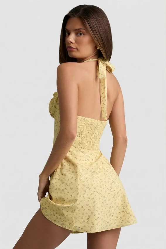 Nerine Halterneck A-Line Mini Dress in Yellow Flower Print Nerine Halterneck A-Line Mini Dress in Yellow Flower Print