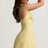 Nerine Halterneck A-Line Mini Dress in Yellow Flower Print Nerine Halterneck A-Line Mini Dress in Yellow Flower Print