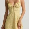 Nerine Halterneck A-Line Mini Dress in Yellow Flower Print Nerine Halterneck A-Line Mini Dress in Yellow Flower Print