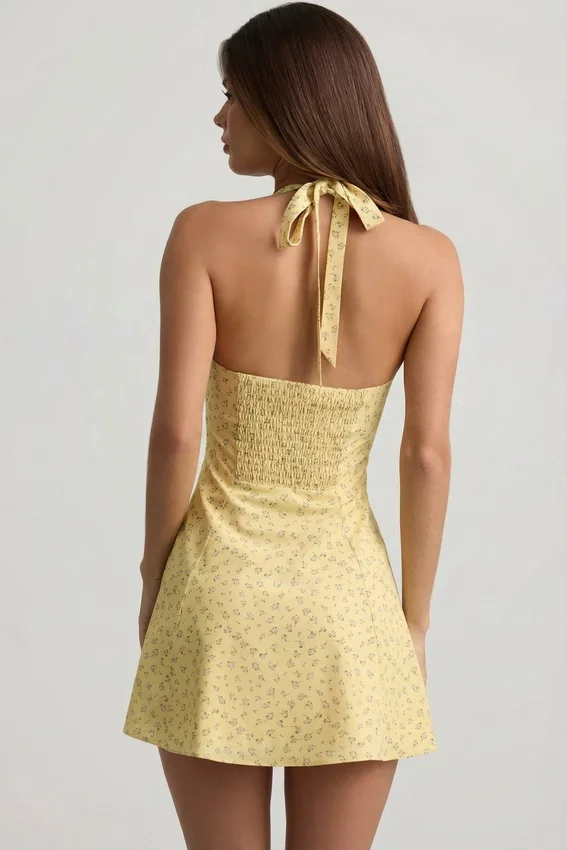 Nerine Halterneck A-Line Mini Dress in Yellow Flower Print Nerine Halterneck A-Line Mini Dress in Yellow Flower Print