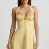 Nerine Halterneck A-Line Mini Dress in Yellow Flower Print Nerine Halterneck A-Line Mini Dress in Yellow Flower Print