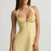 Nerine Halterneck A-Line Mini Dress in Yellow Flower Print Nerine Halterneck A-Line Mini Dress in Yellow Flower Print