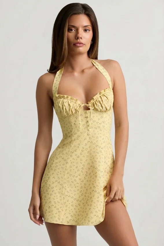 Nerine Halterneck A-Line Mini Dress in Yellow Flower Print Nerine Halterneck A-Line Mini Dress in Yellow Flower Print