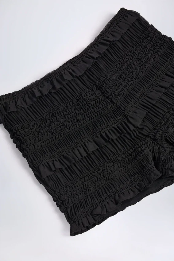 Orla Ruffled Mid-Rise Shorts in Black Orla Ruffled Mid-Rise Shorts in Black