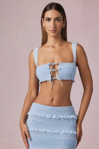 Ottilie Ruffle Tie-Front Crop Top in Powder Blue Ottilie Ruffle Tie-Front Crop Top in Powder Blue