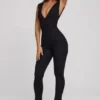 Romana Plunge Neck Ruched Waist Jumpsuit in Black Romana Plunge Neck Ruched Waist Jumpsuit in Black