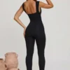 Romana Plunge Neck Ruched Waist Jumpsuit in Black Romana Plunge Neck Ruched Waist Jumpsuit in Black