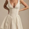Sabina Broderie Anglaise Bow-Detail A-Line Mini Dress in Ivory Sabina Broderie Anglaise Bow-Detail A-Line Mini Dress in Ivory