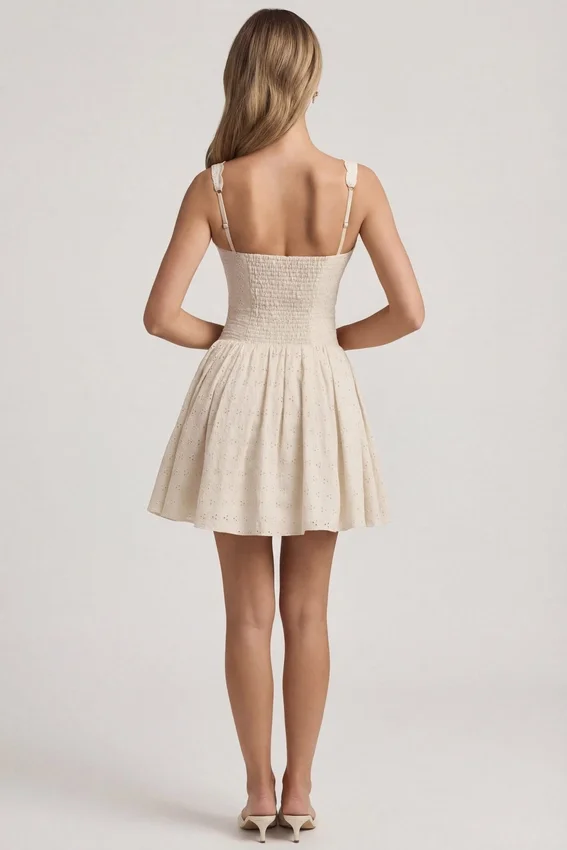Sabina Broderie Anglaise Bow-Detail A-Line Mini Dress in Ivory Sabina Broderie Anglaise Bow-Detail A-Line Mini Dress in Ivory