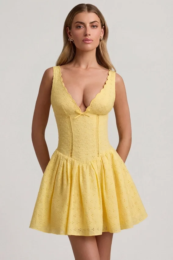 Sabina Broderie Anglaise Bow-Detail A-Line Mini Dress in Pastel Yellow Sabina Broderie Anglaise Bow-Detail A-Line Mini Dress in Pastel Yellow