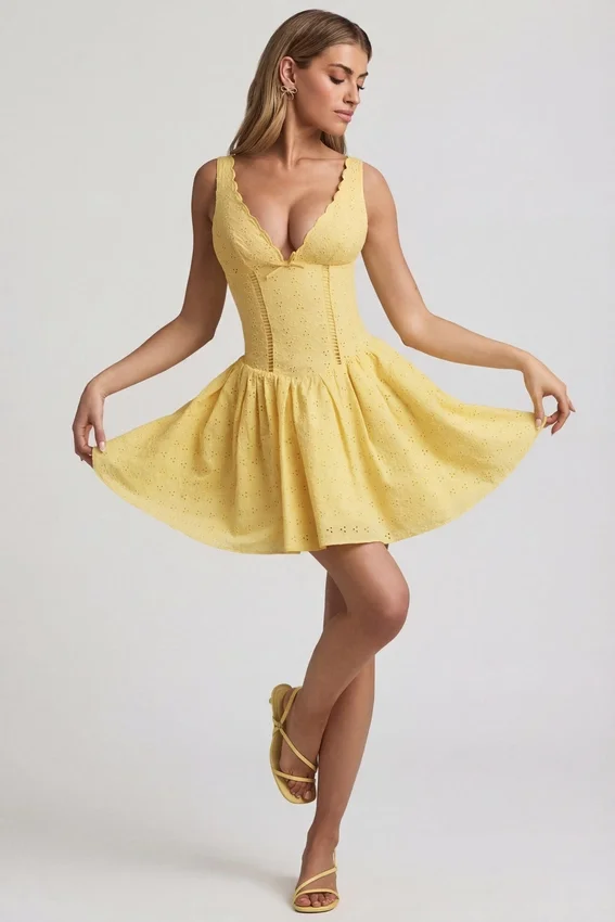Sabina Broderie Anglaise Bow-Detail A-Line Mini Dress in Pastel Yellow Sabina Broderie Anglaise Bow-Detail A-Line Mini Dress in Pastel Yellow