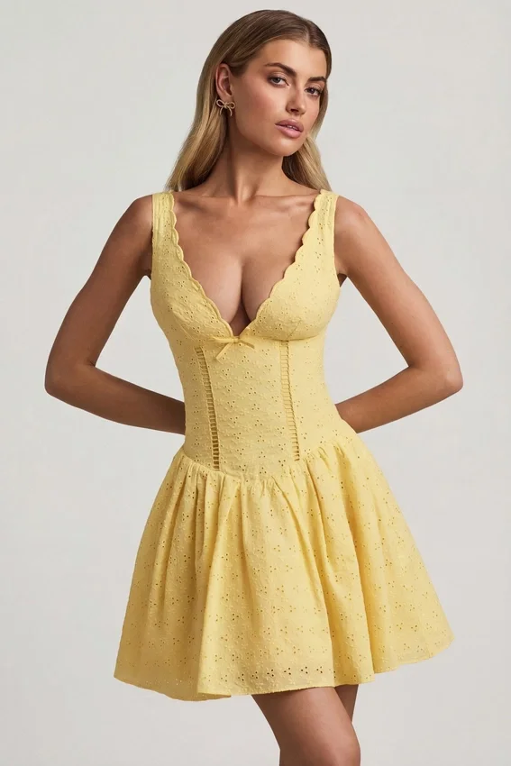 Sabina Broderie Anglaise Bow-Detail A-Line Mini Dress in Pastel Yellow Sabina Broderie Anglaise Bow-Detail A-Line Mini Dress in Pastel Yellow